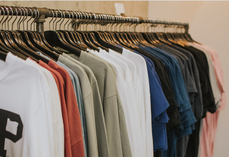 T-shirts hanging on a rack